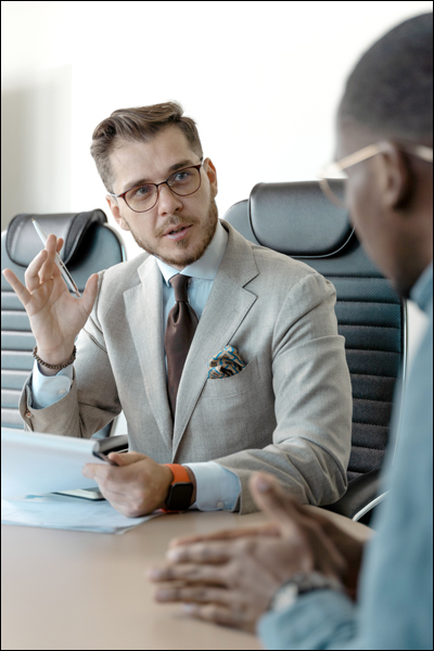 Two men in an interview setting.
